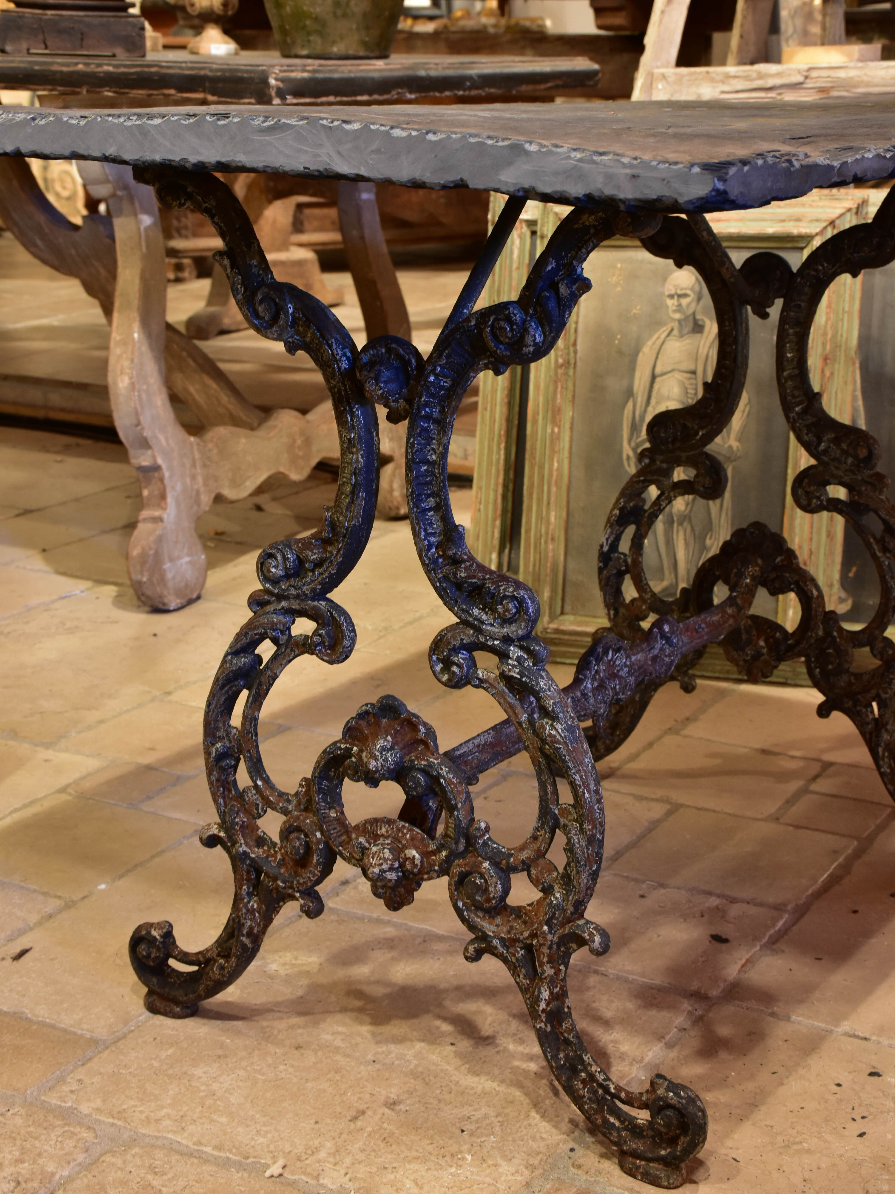 Antique French garden table with slate top and decorative cast iron base