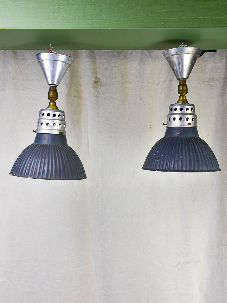 Pair of antique Holophane industrial pendant lights
