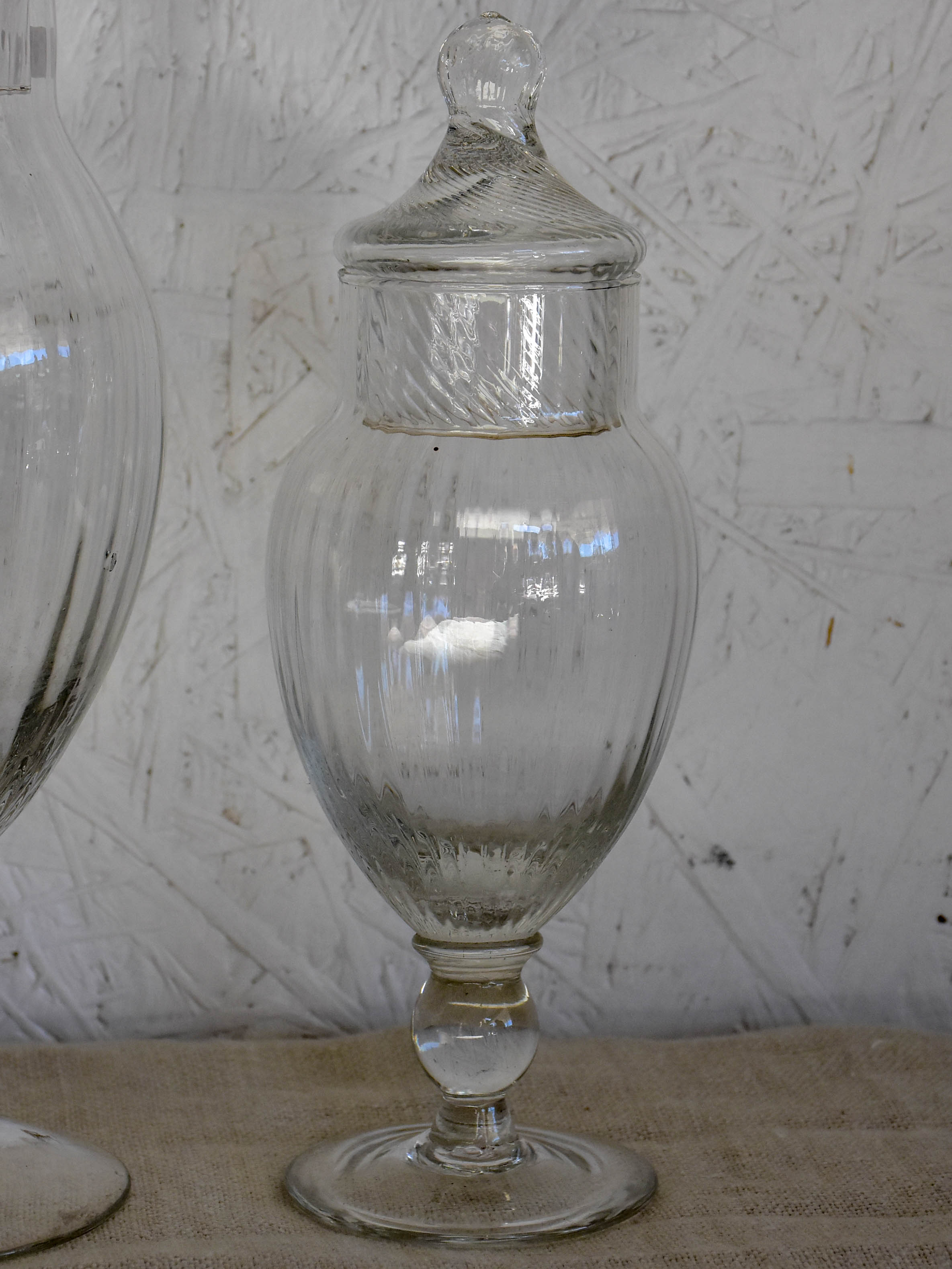 Three vintage French glass vanity jars with lids