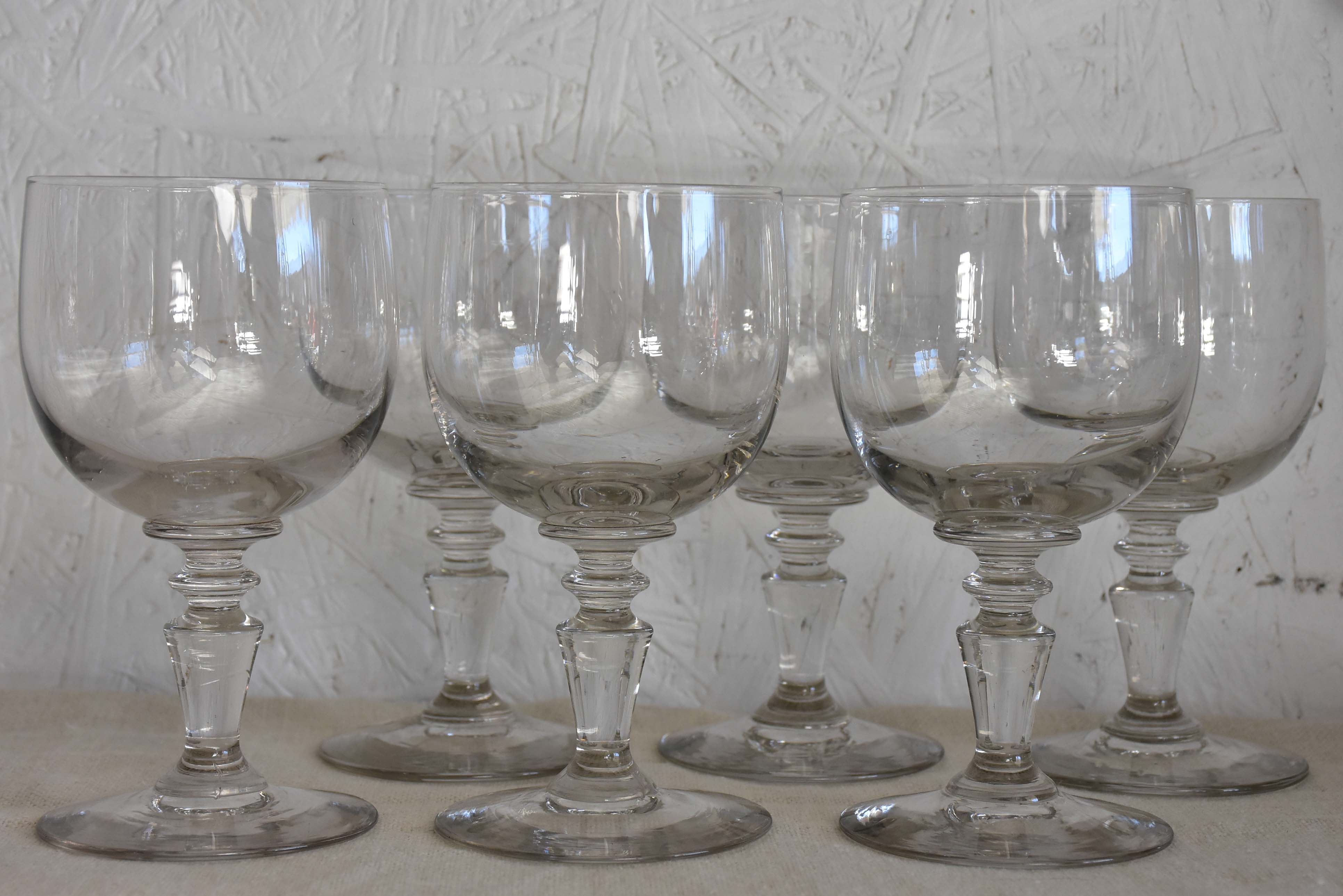 Six antique French wine glasses