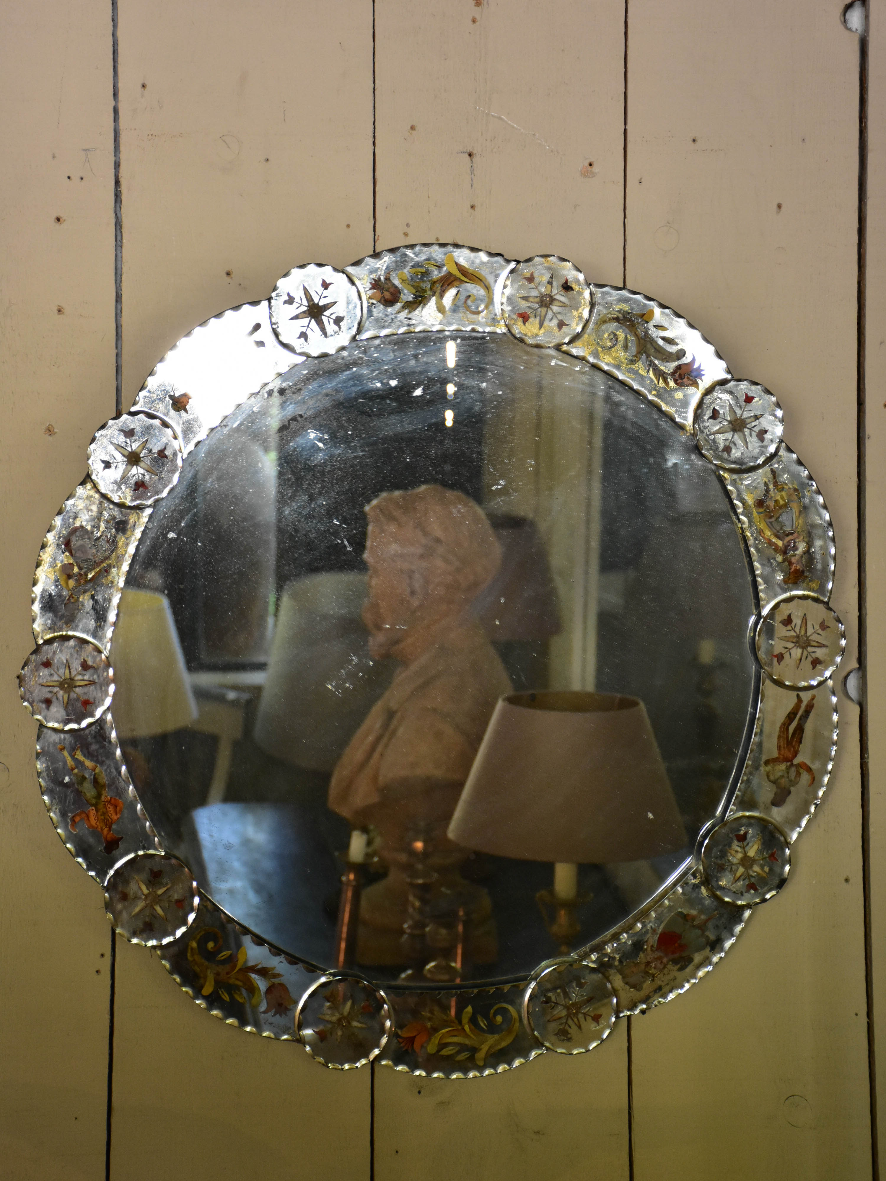 Round art pauvre venetian mirror