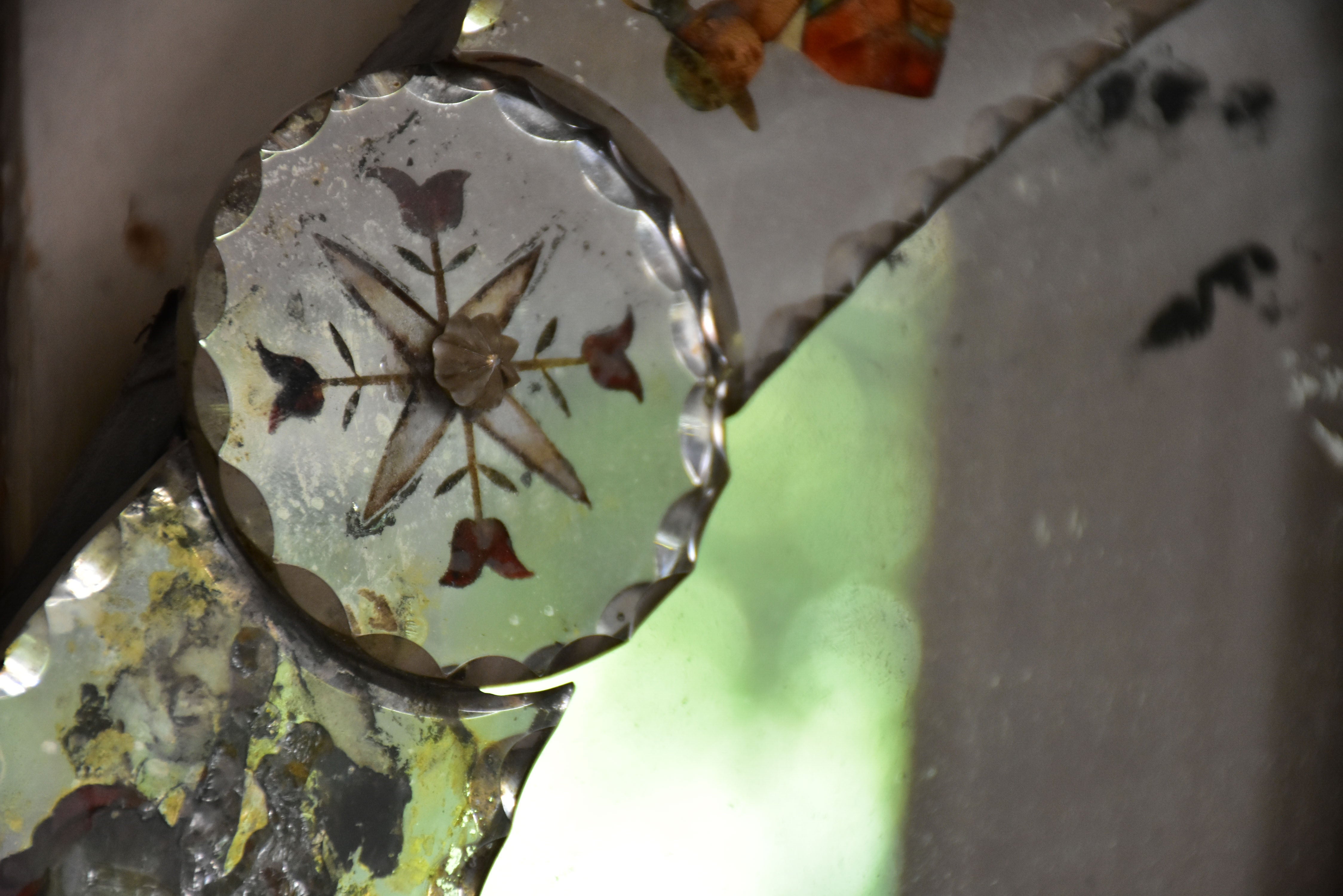 Round art pauvre venetian mirror