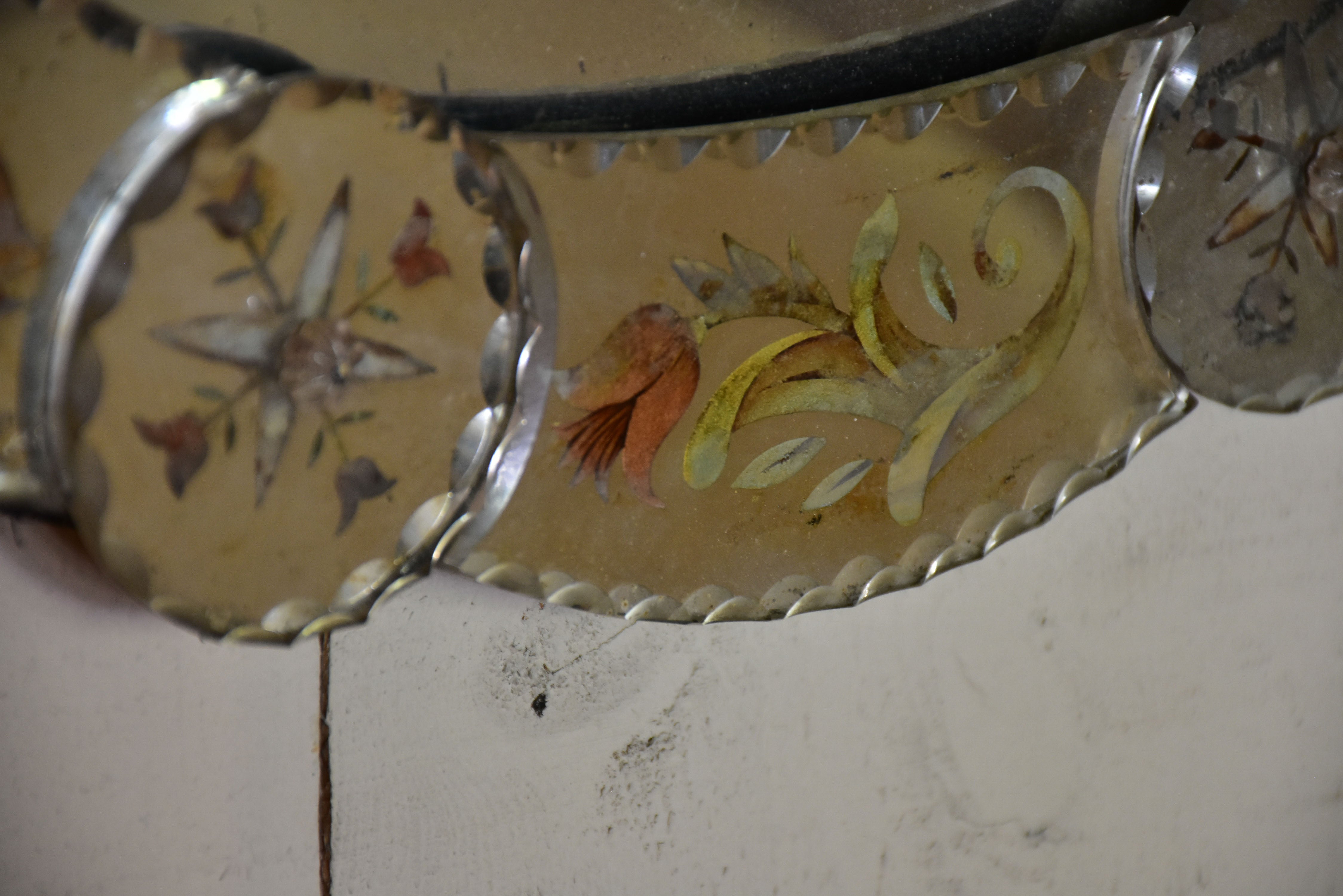 Round art pauvre venetian mirror