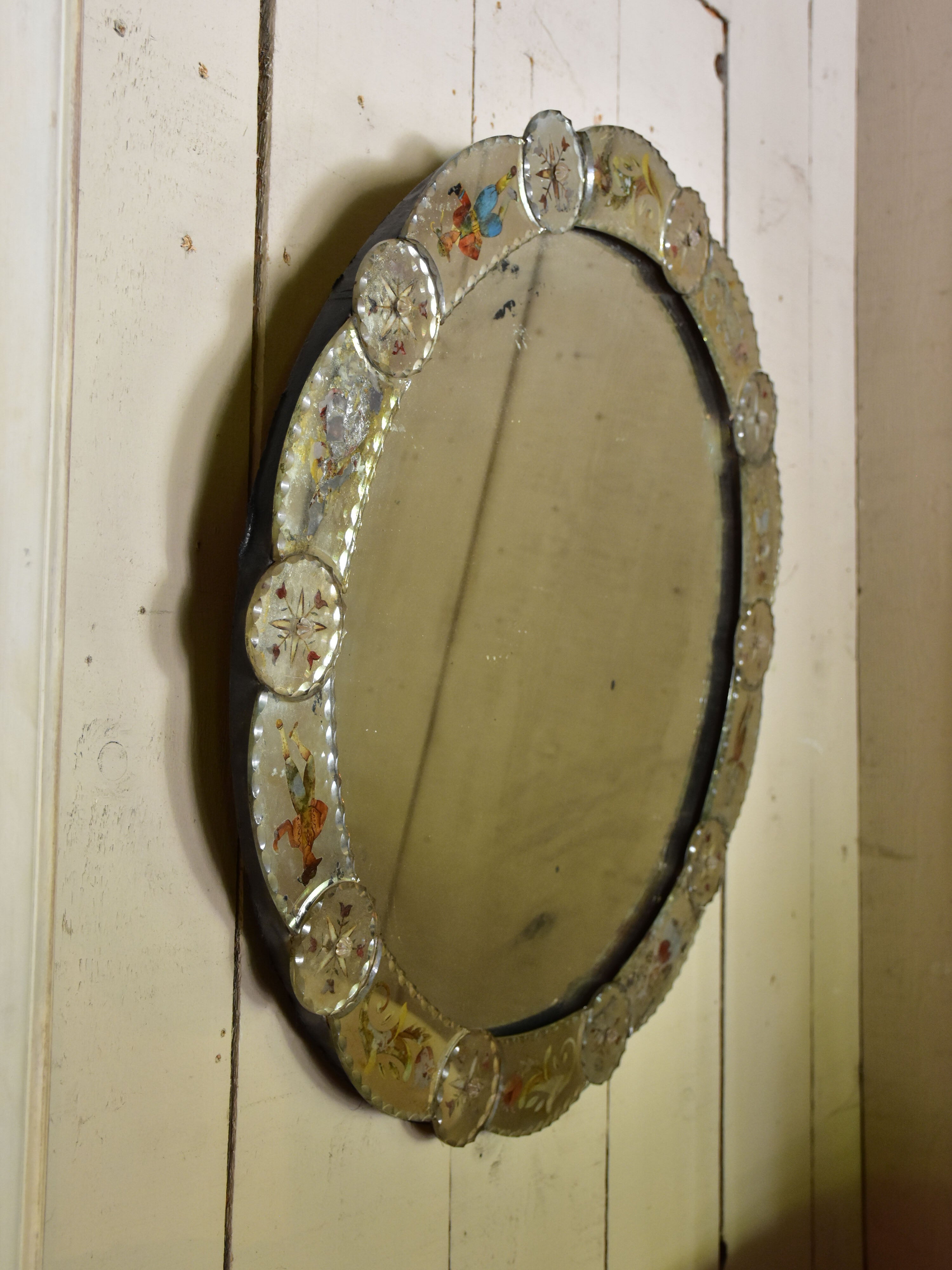 Round art pauvre venetian mirror
