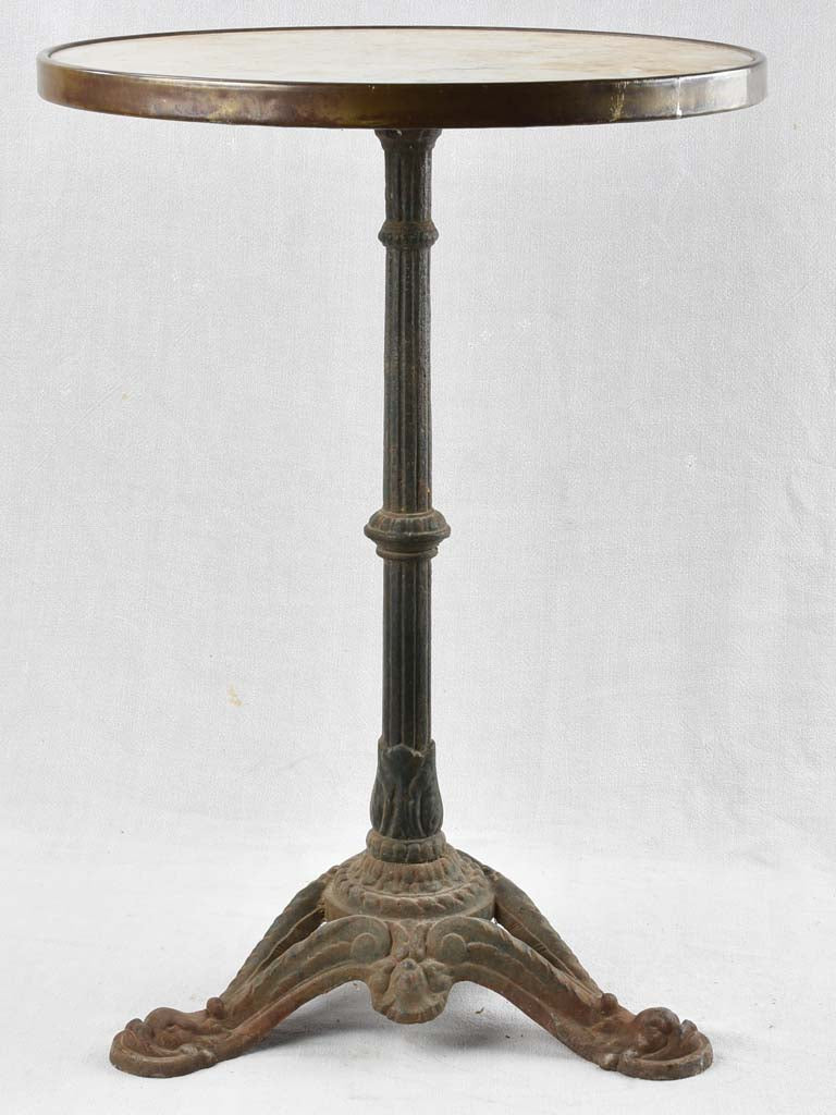 Round 1950's bistro table with white Carrara marble and a cast iron base 28¼"