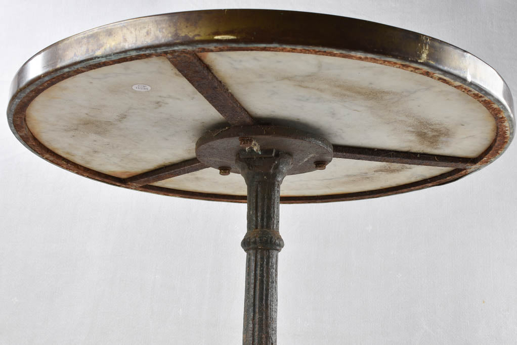 Round 1950's bistro table with white Carrara marble and a cast iron base 28¼"