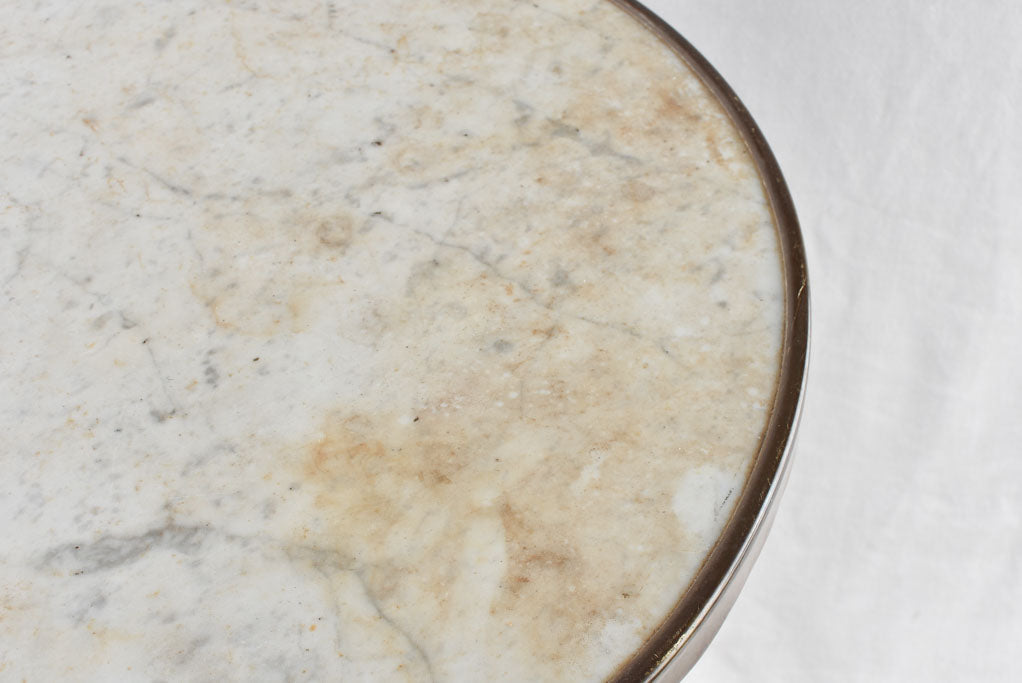 Round 1950's bistro table with white Carrara marble and a cast iron base 28¼"