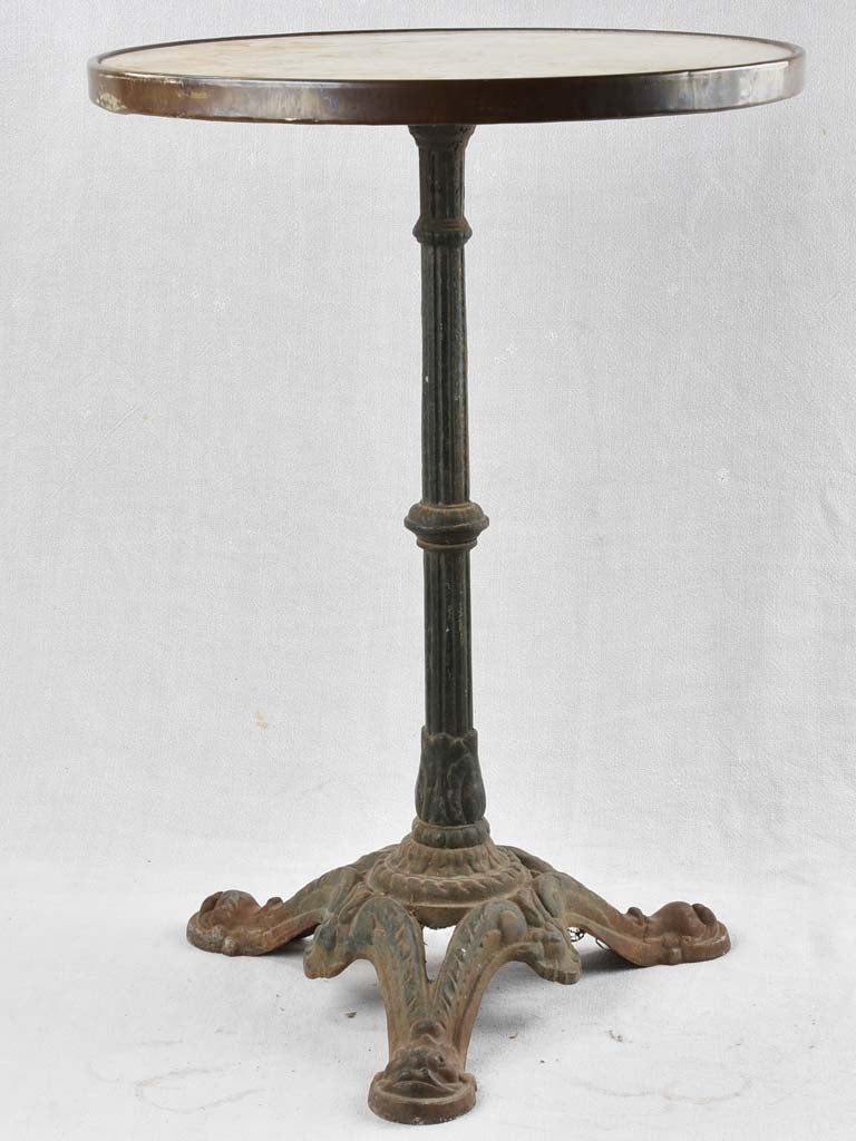 Round 1950's bistro table with white Carrara marble and a cast iron base 28¼"