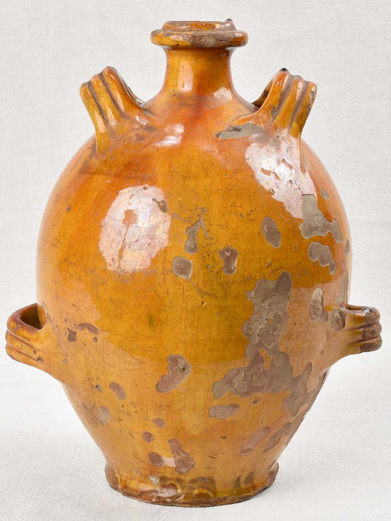 Ochre glazed conscience jug with 4 handles 14½"