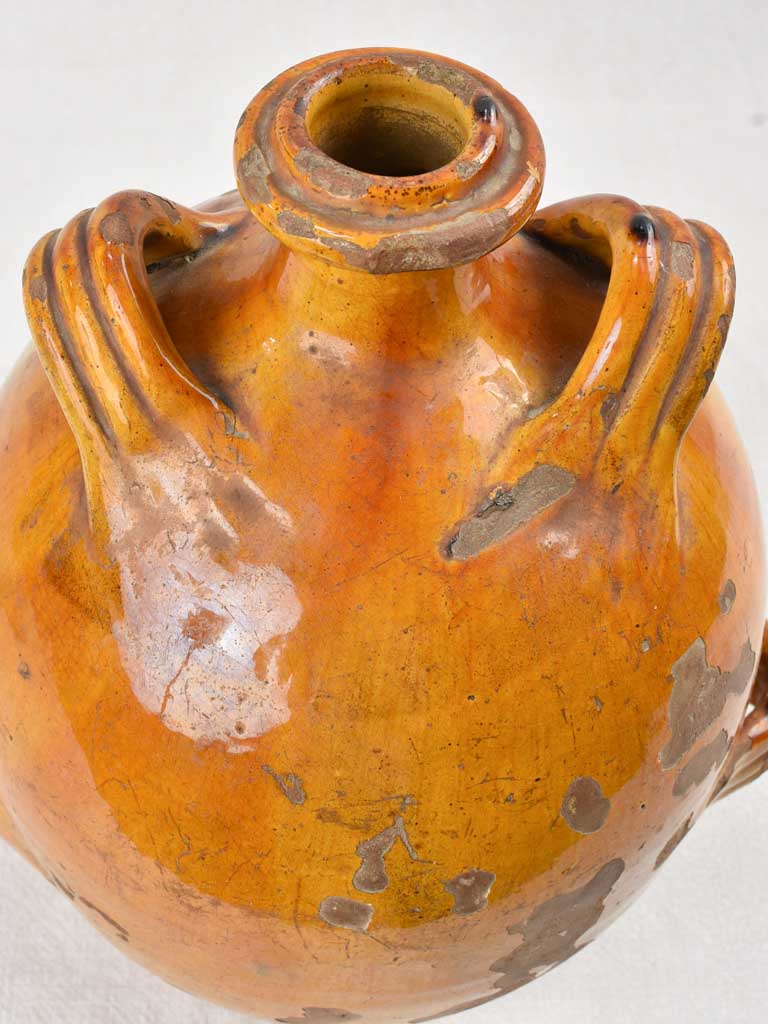 Ochre glazed conscience jug with 4 handles 14½"