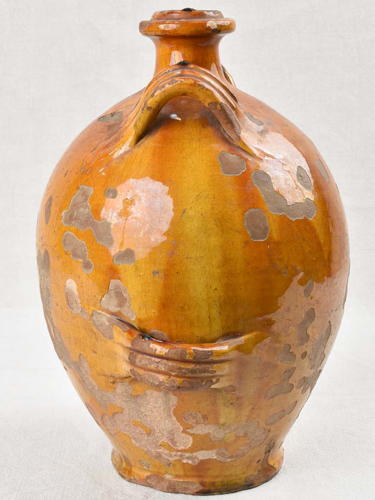 Ochre glazed conscience jug with 4 handles 14½"