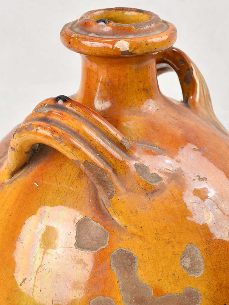 Ochre glazed conscience jug with 4 handles 14½"