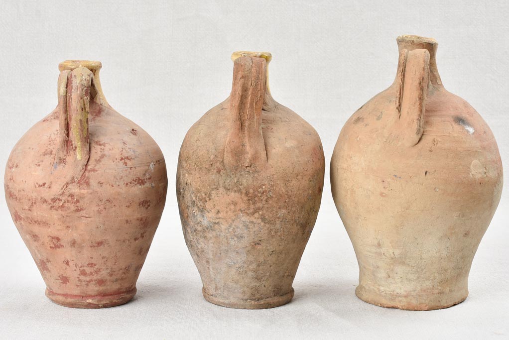 Collection of three antique French water jugs 9½"
