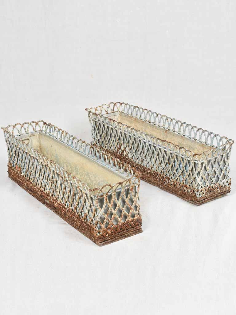 Pair of 19th century wrought iron window planters with rustic blue patina 32¾"