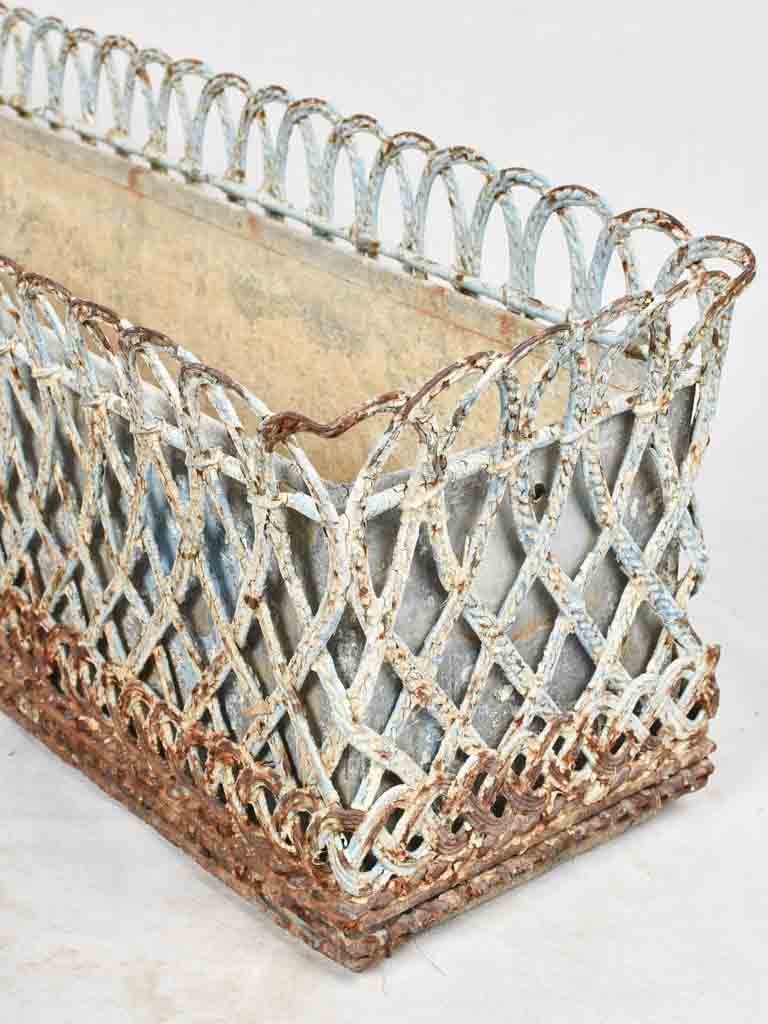 Pair of 19th century wrought iron window planters with rustic blue patina 32¾"