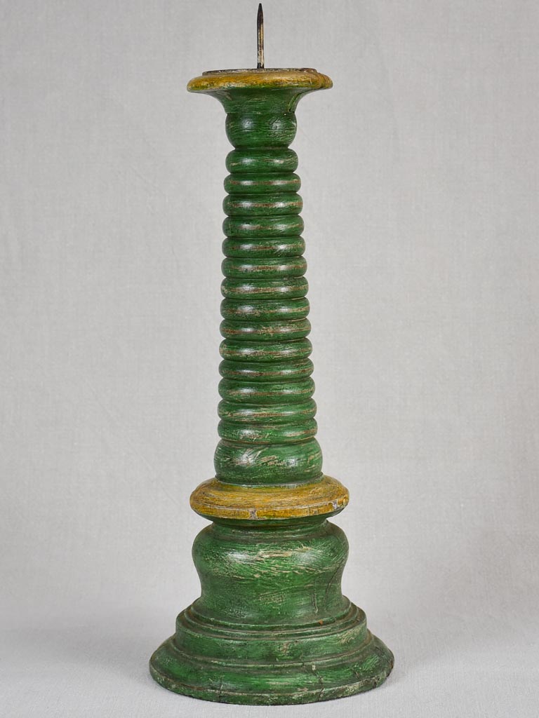 Large 18th-century wooden candlestick with green patina 21¼"