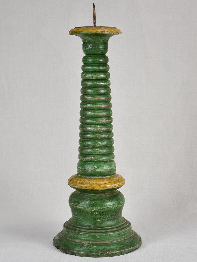 Large 18th-century wooden candlestick with green patina 21¼"