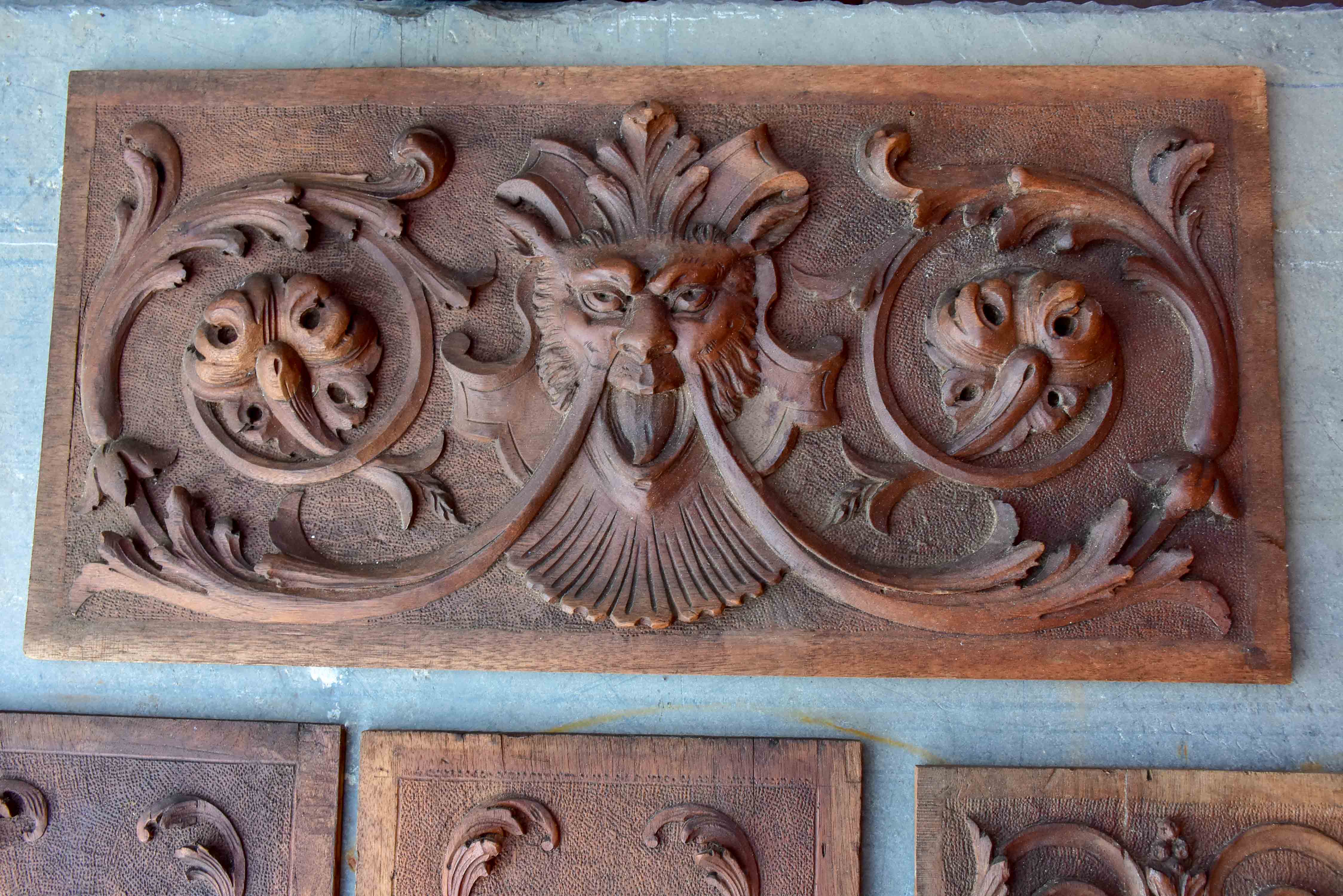 Five pieces of antique Italian carved wood paneling