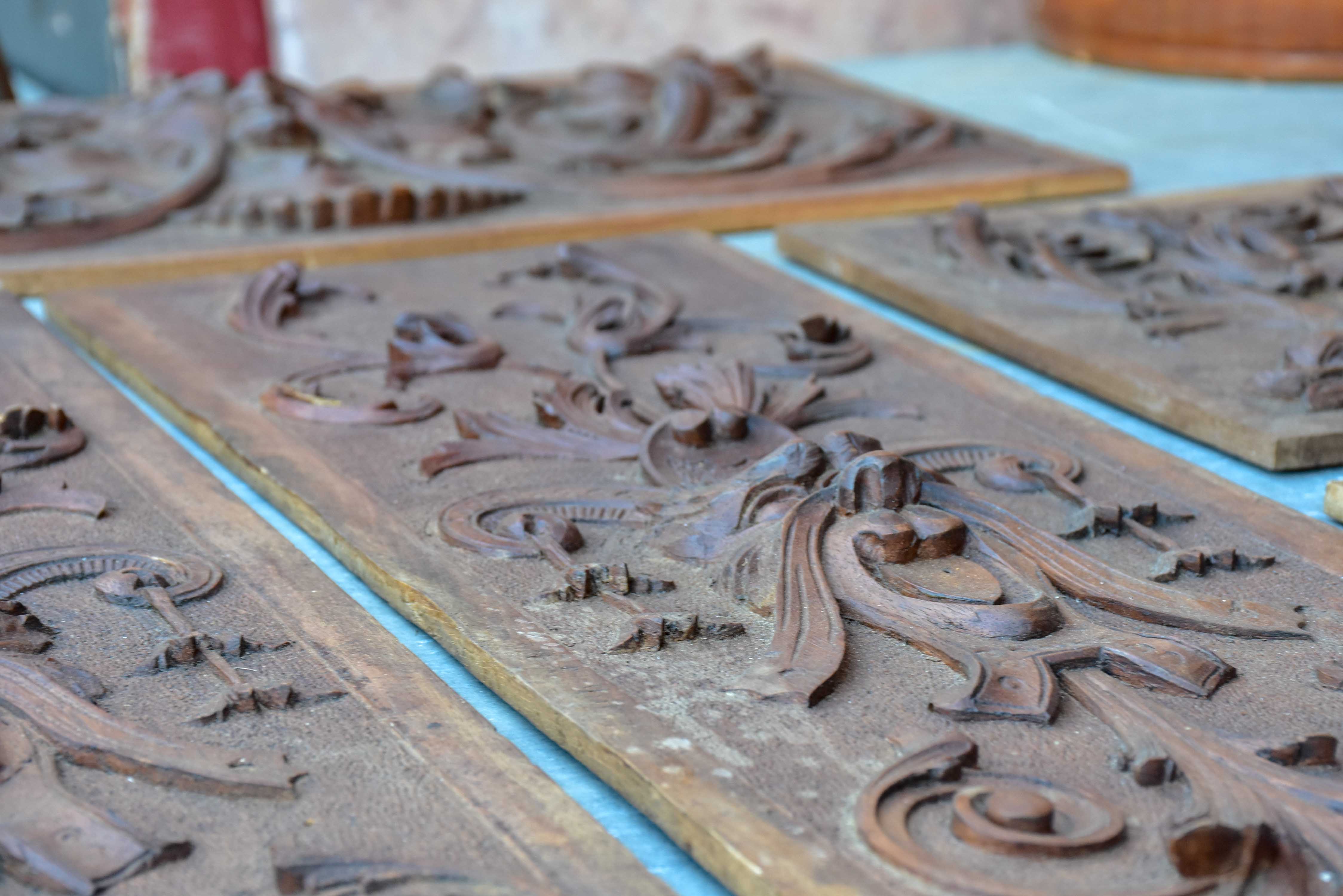 Five pieces of antique Italian carved wood paneling