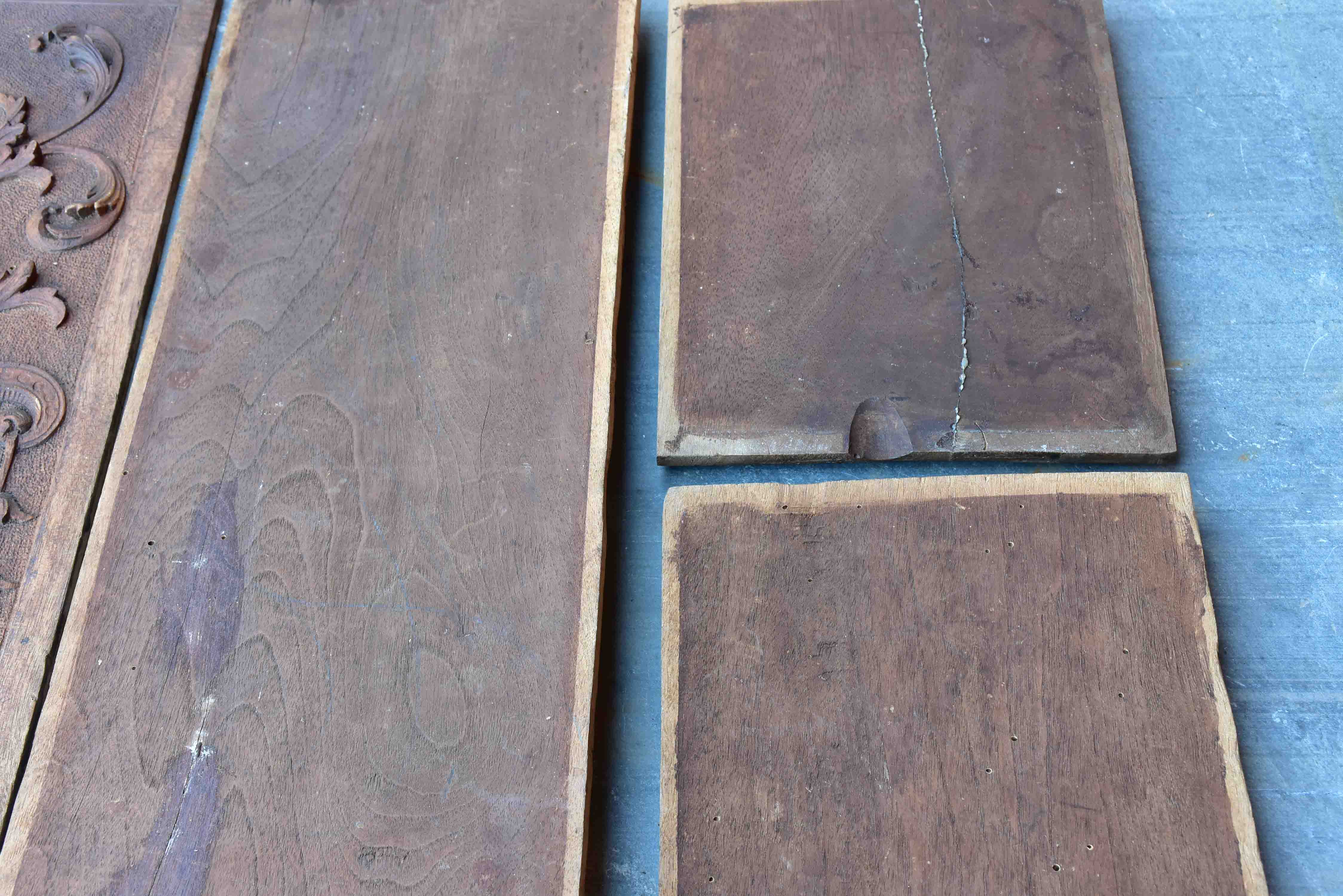Five pieces of antique Italian carved wood paneling