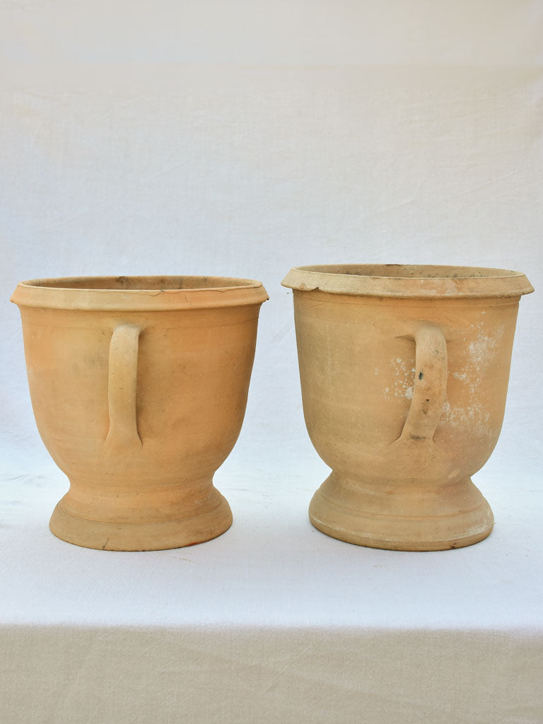 Small pair of terracotta Castelnaudary planters with four handles - 1940's 15¼"