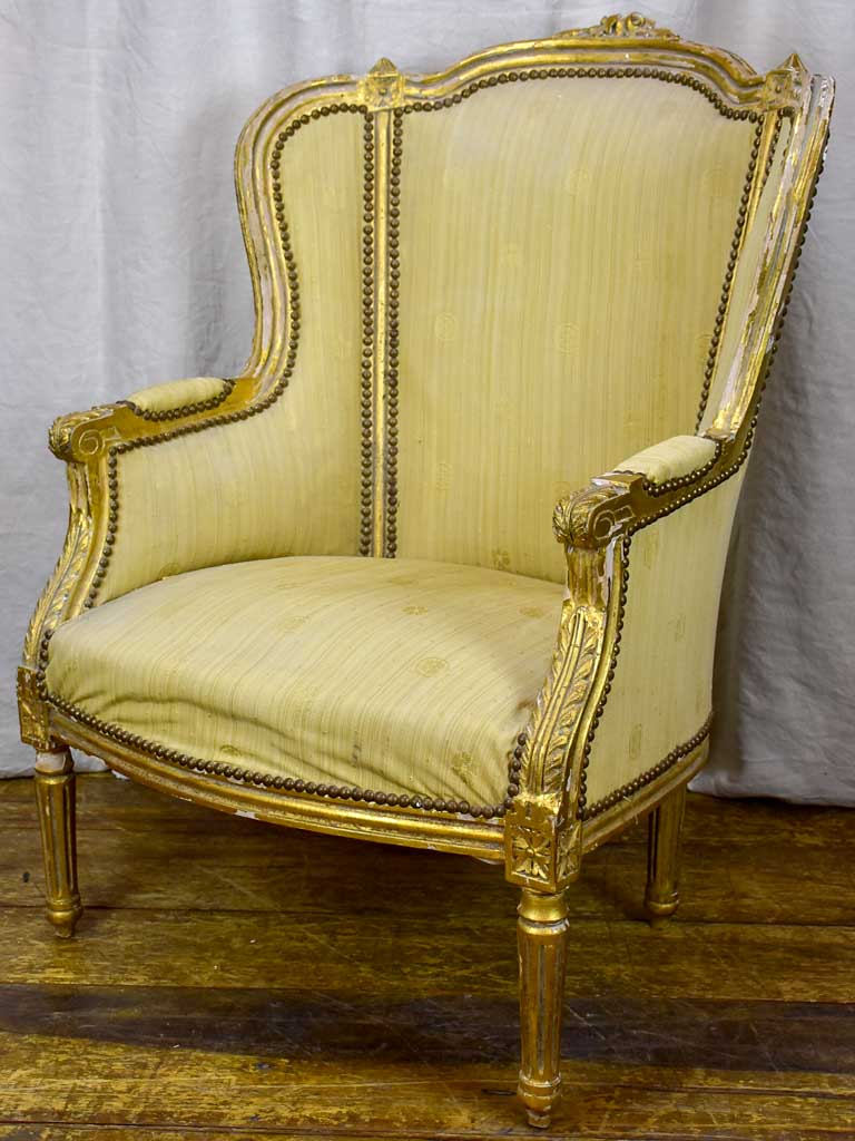 Pair of antique Louis XVI gilded armchairs
