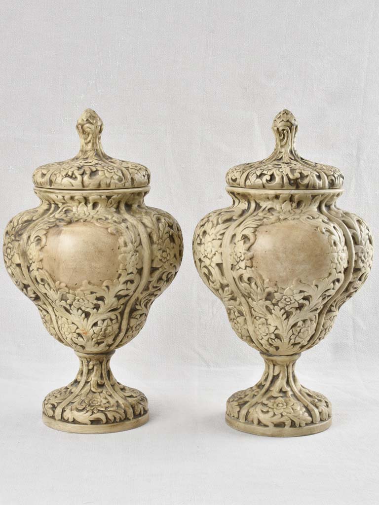 Pair of intricate Italian floral urns 19"