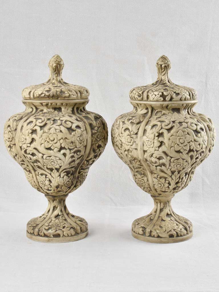 Pair of intricate Italian floral urns 19"
