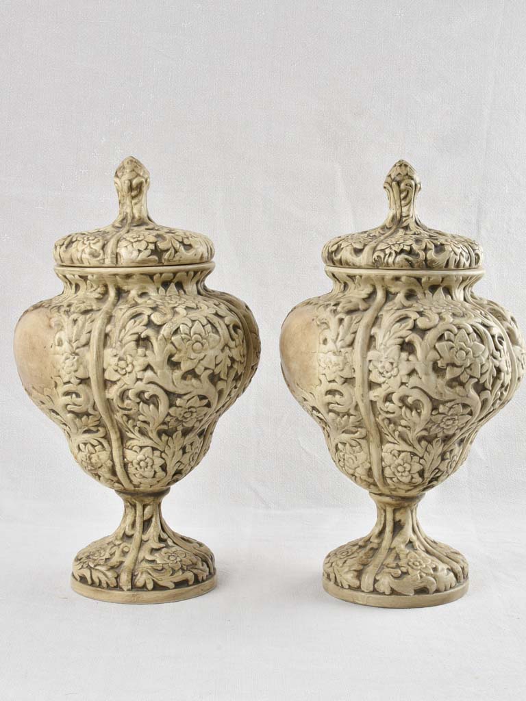 Pair of intricate Italian floral urns 19"