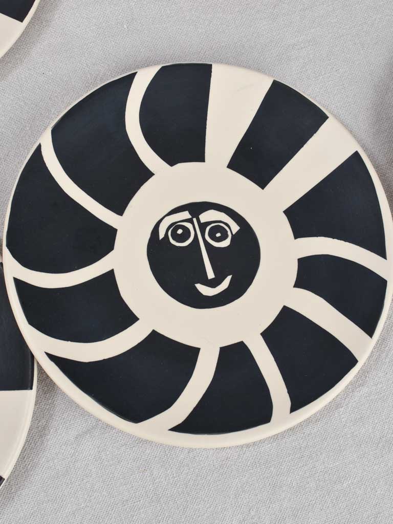 12 plates, beige & black, abstract faces 9"