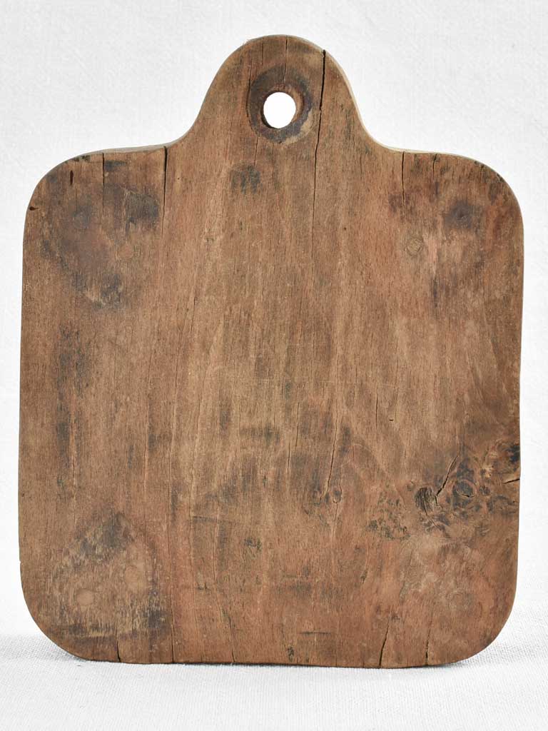Small rustic walnut cutting board 8¾"