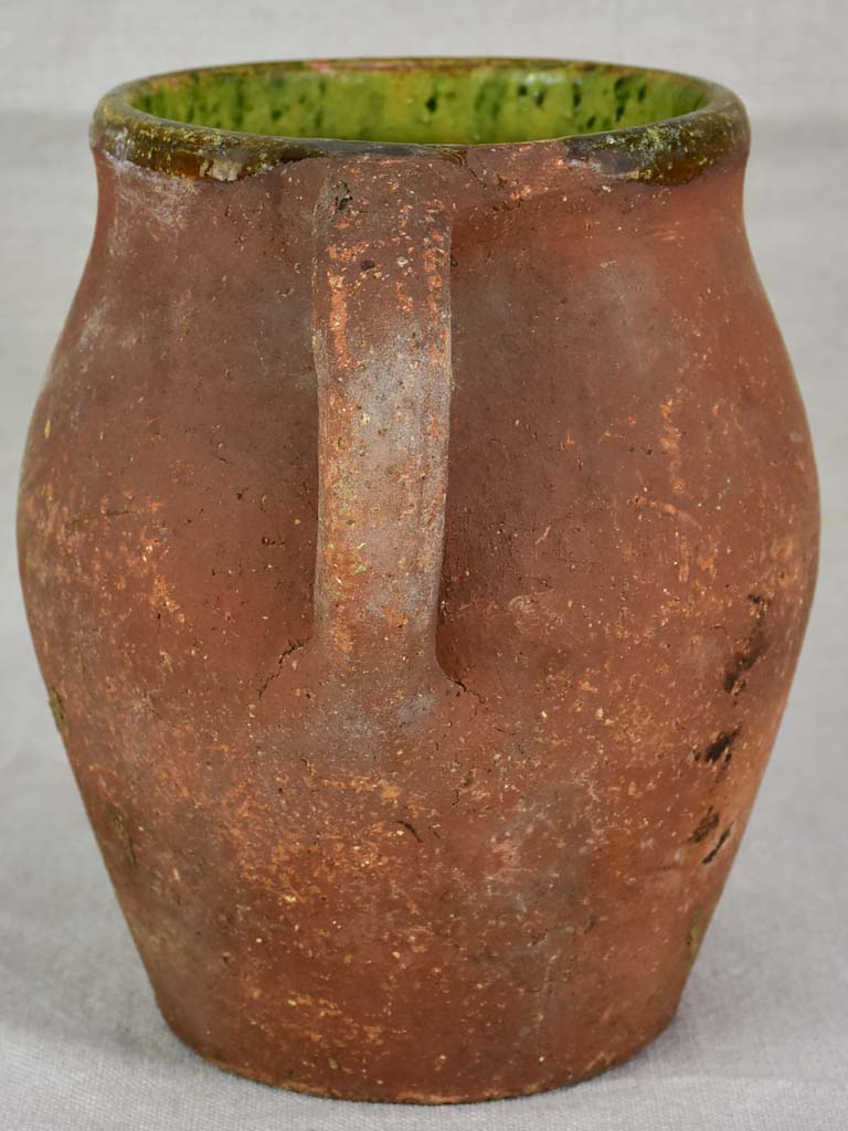 19th century French pitcher with green glaze inside 8"