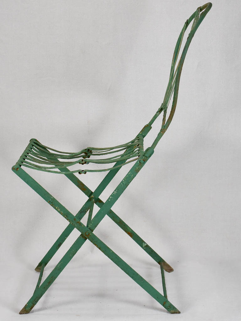 Pair of folding chairs from the military with green patina