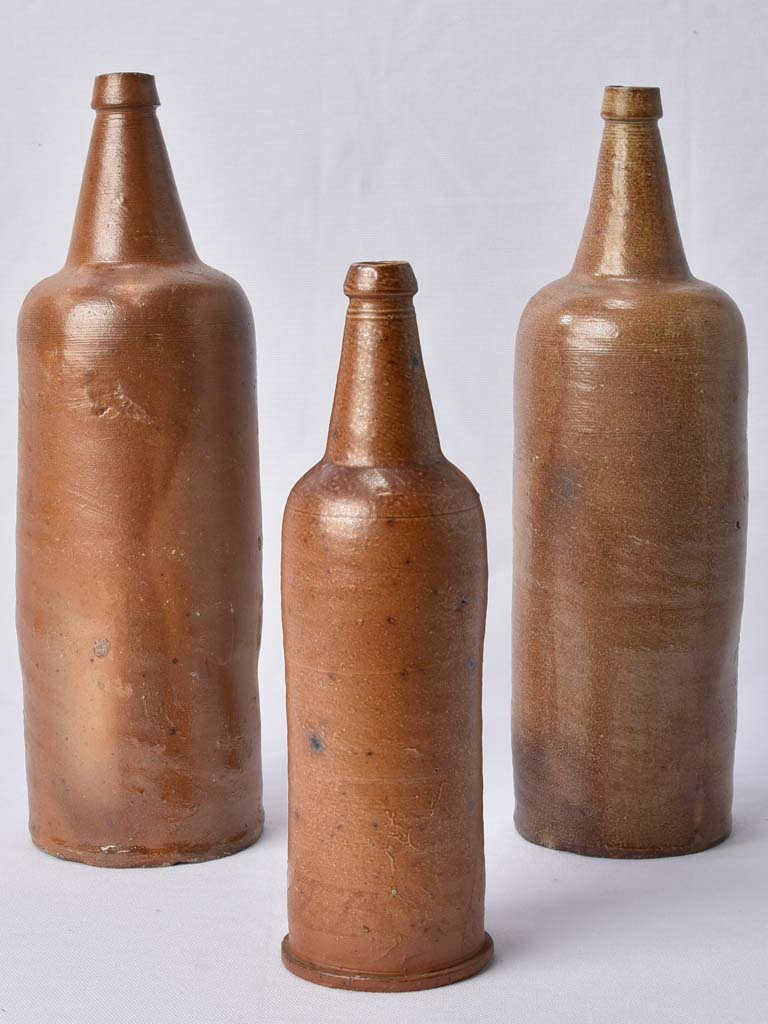 3 sandstone long bottles from Normandy 12¼"