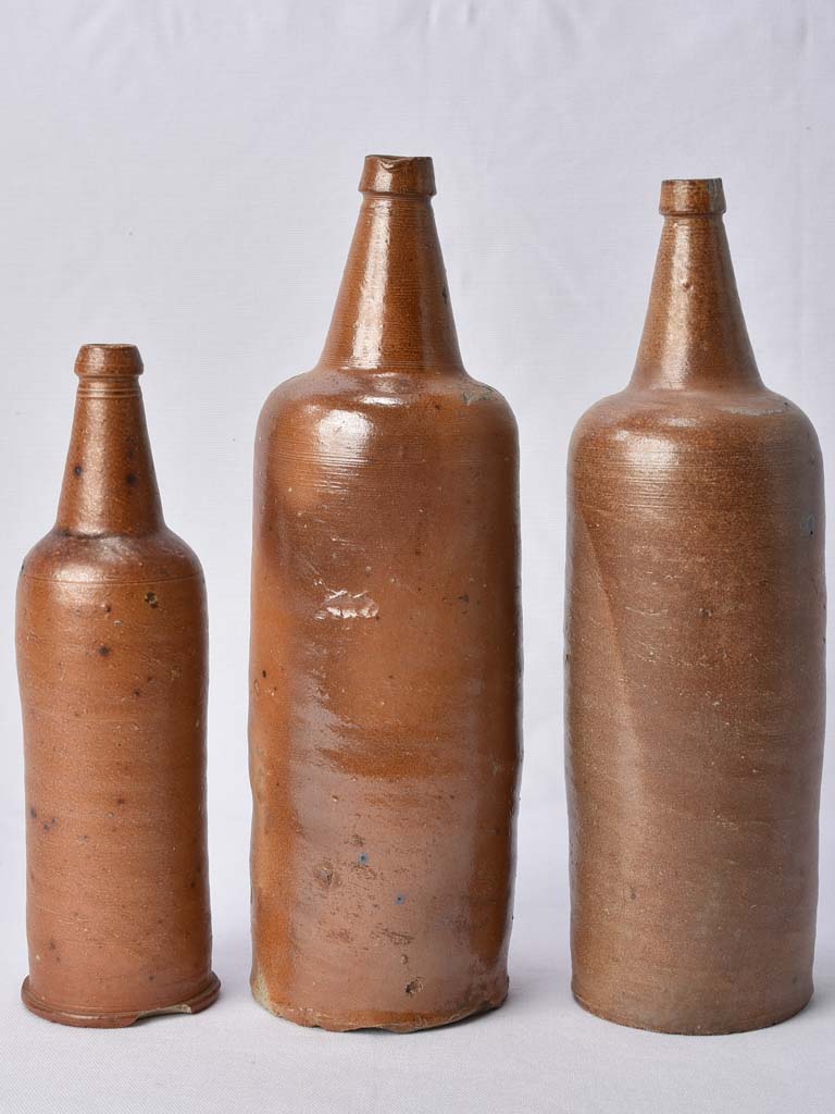 3 sandstone long bottles from Normandy 12¼"