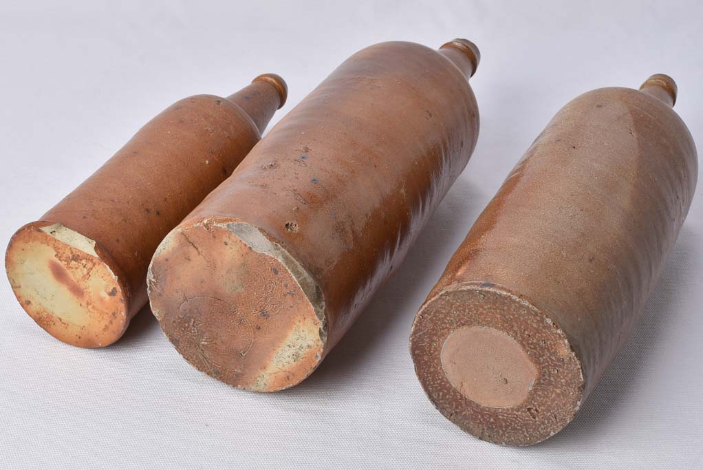3 sandstone long bottles from Normandy 12¼"