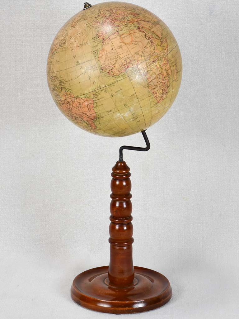 Early 20th-century spinning world globe on wooden stand 20"