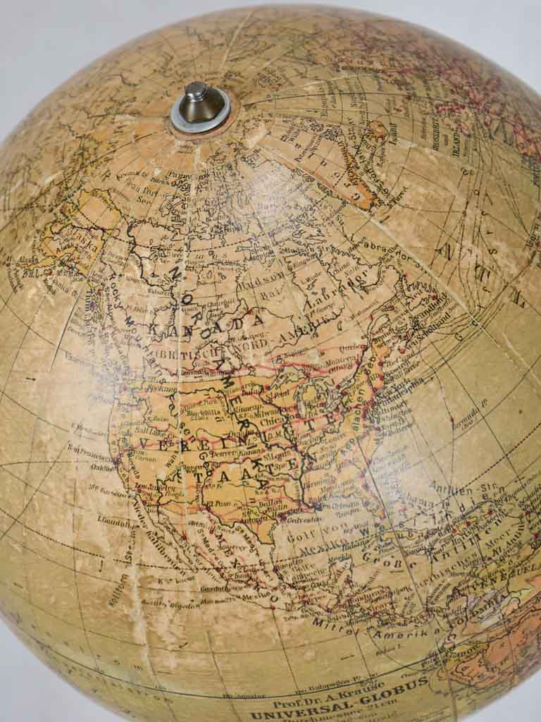 Early 20th-century spinning world globe on wooden stand 20"