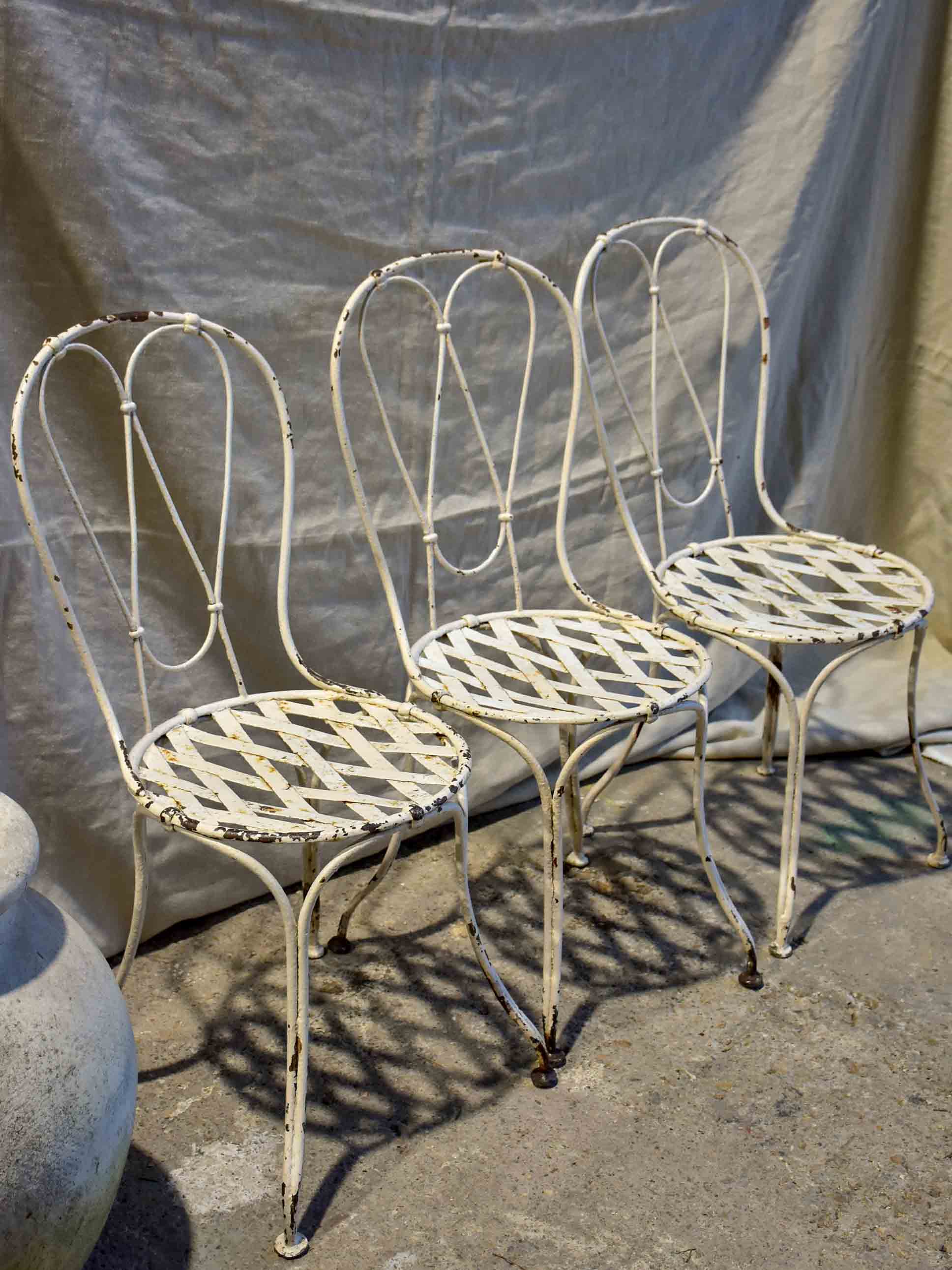 Three antique French garden chairs