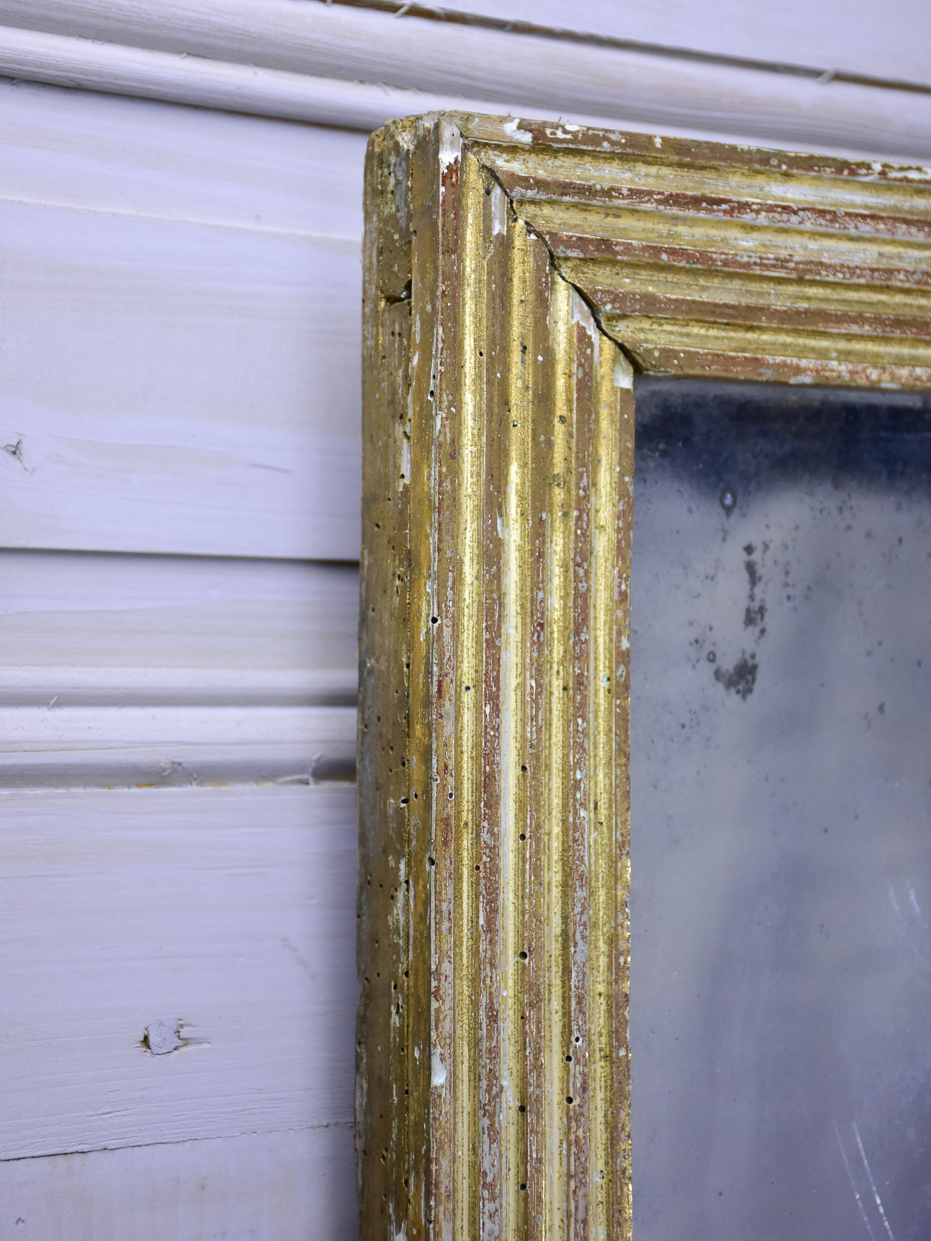 Antique Louis XVI mirror with reeded frame