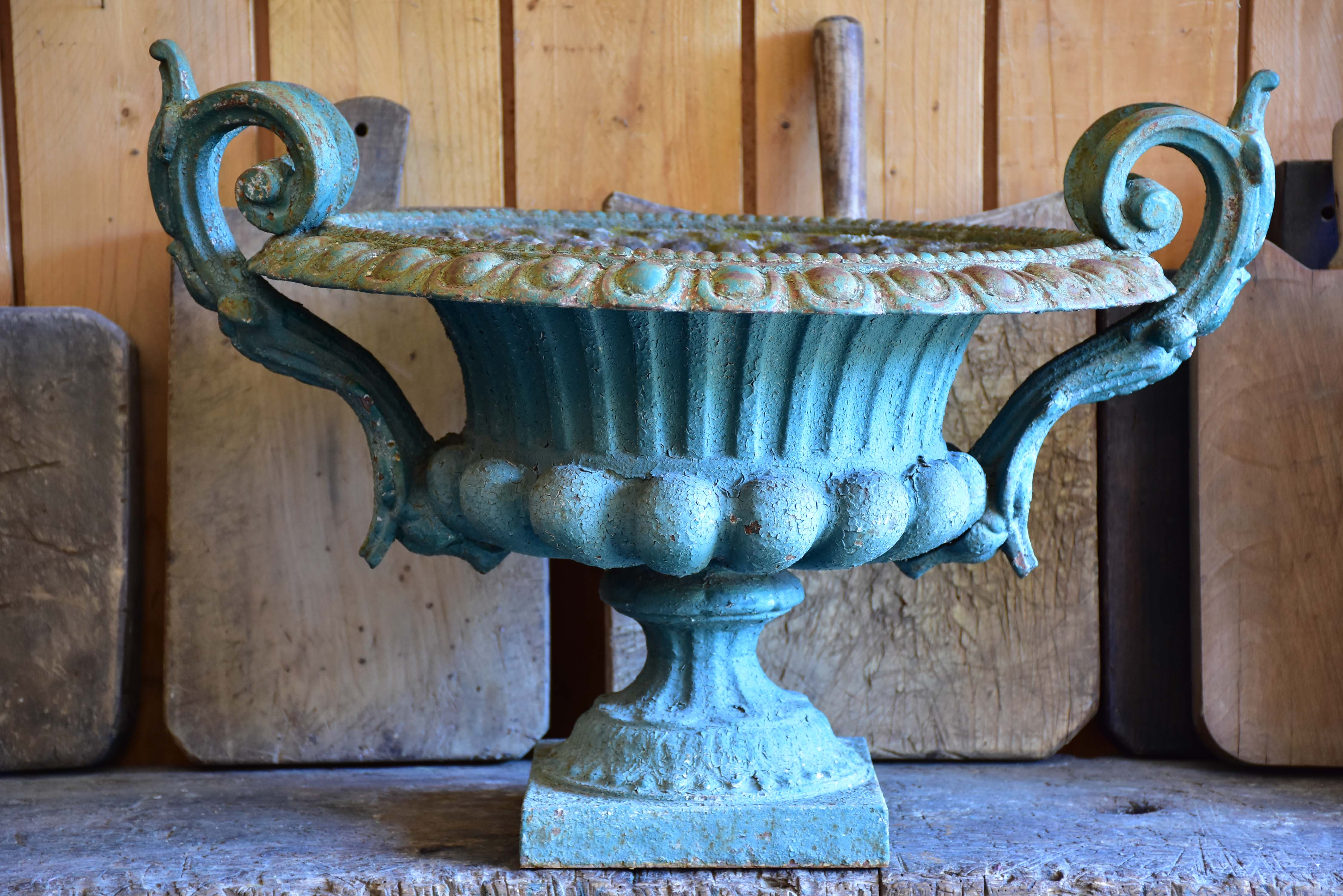 Late 19th century Chambord garden urn with green patina and decorative handles