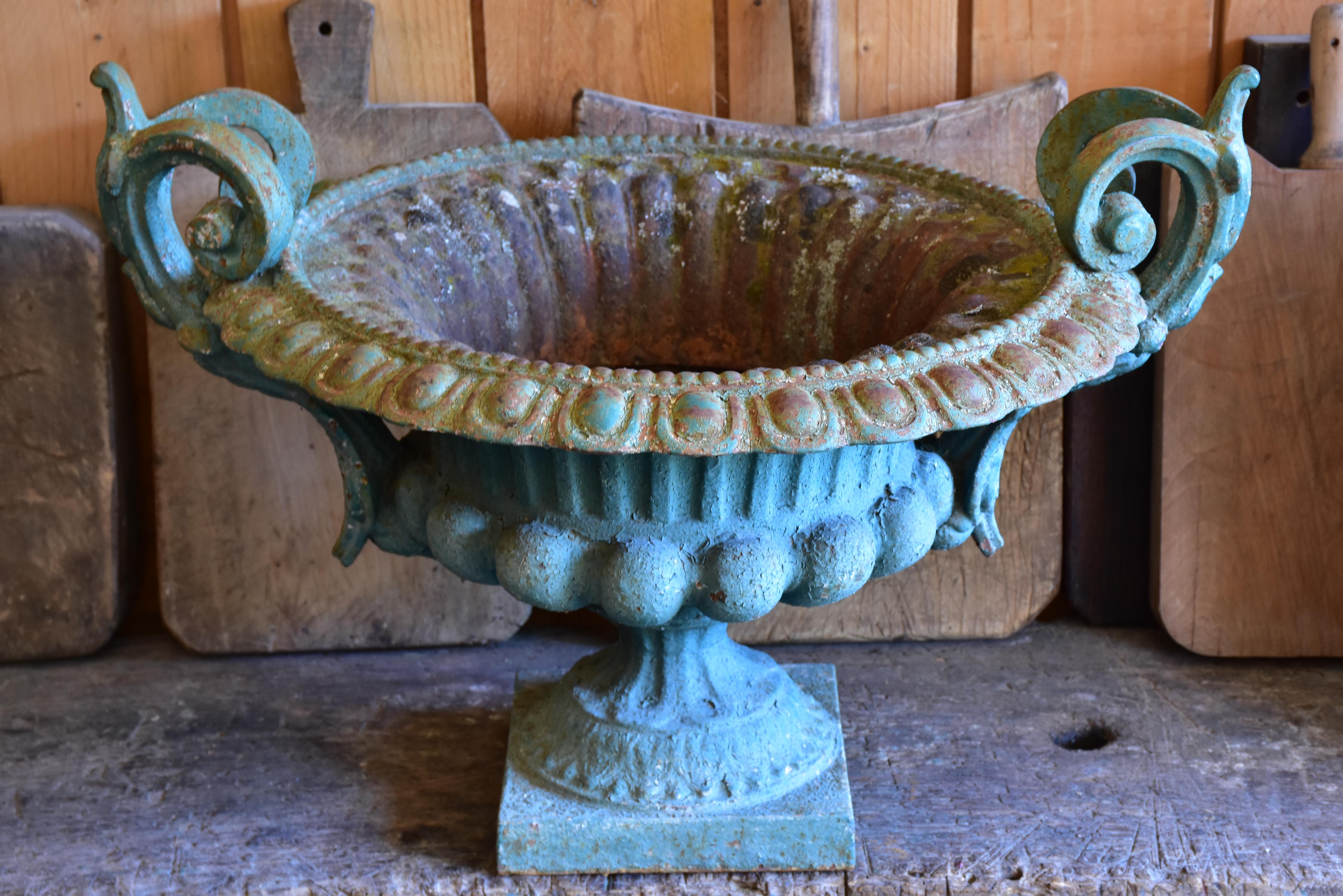 Late 19th century Chambord garden urn with green patina and decorative handles