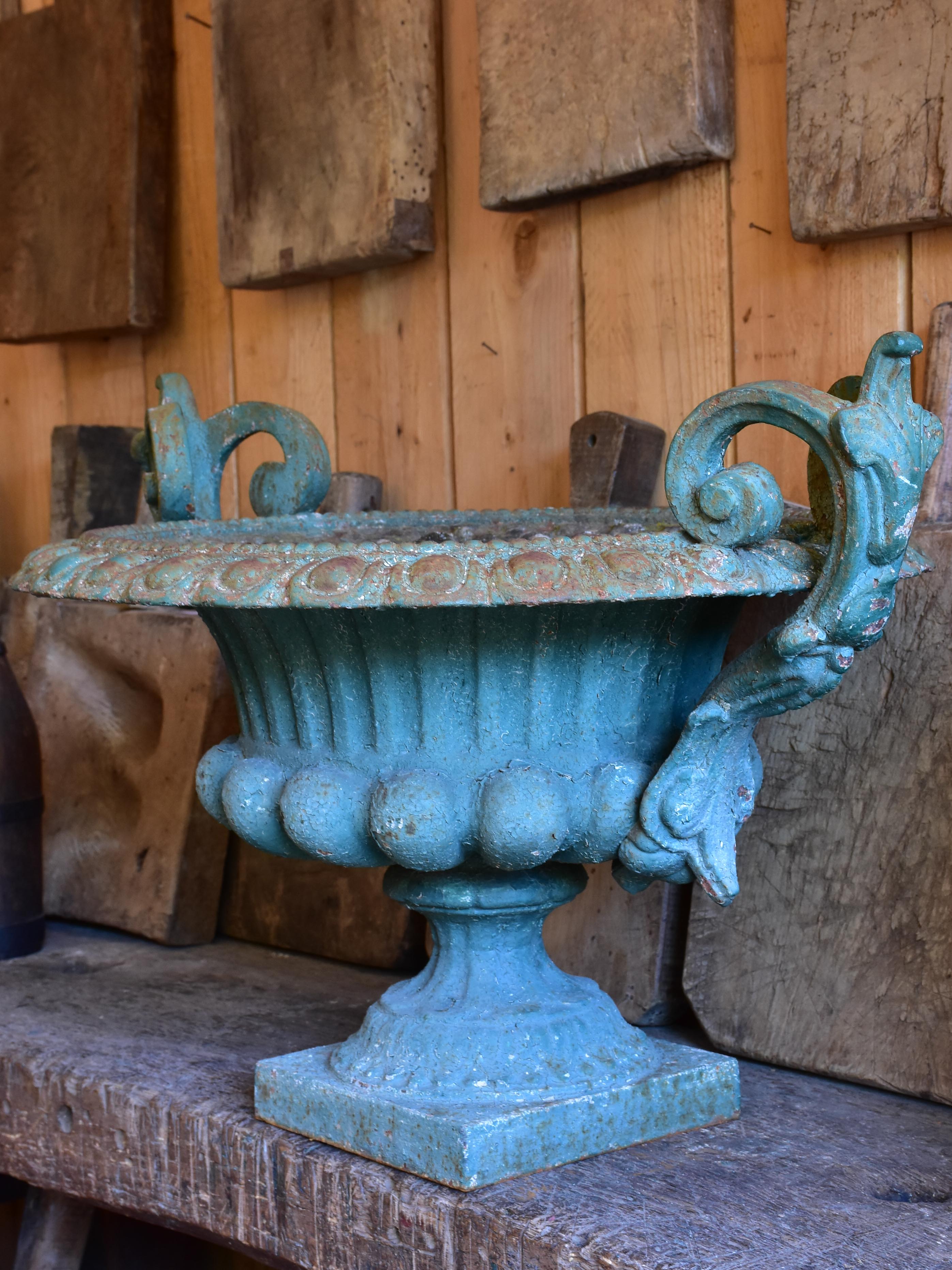 Late 19th century Chambord garden urn with green patina and decorative handles