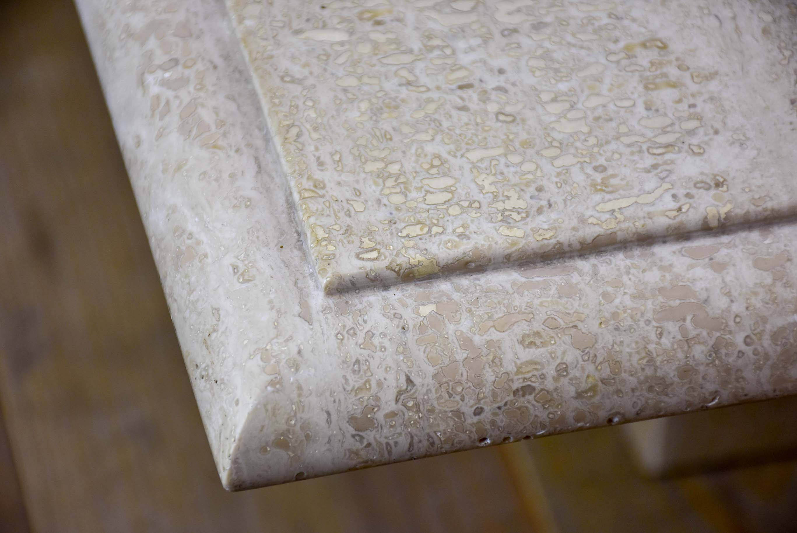 Three vintage travertine nesting side tables