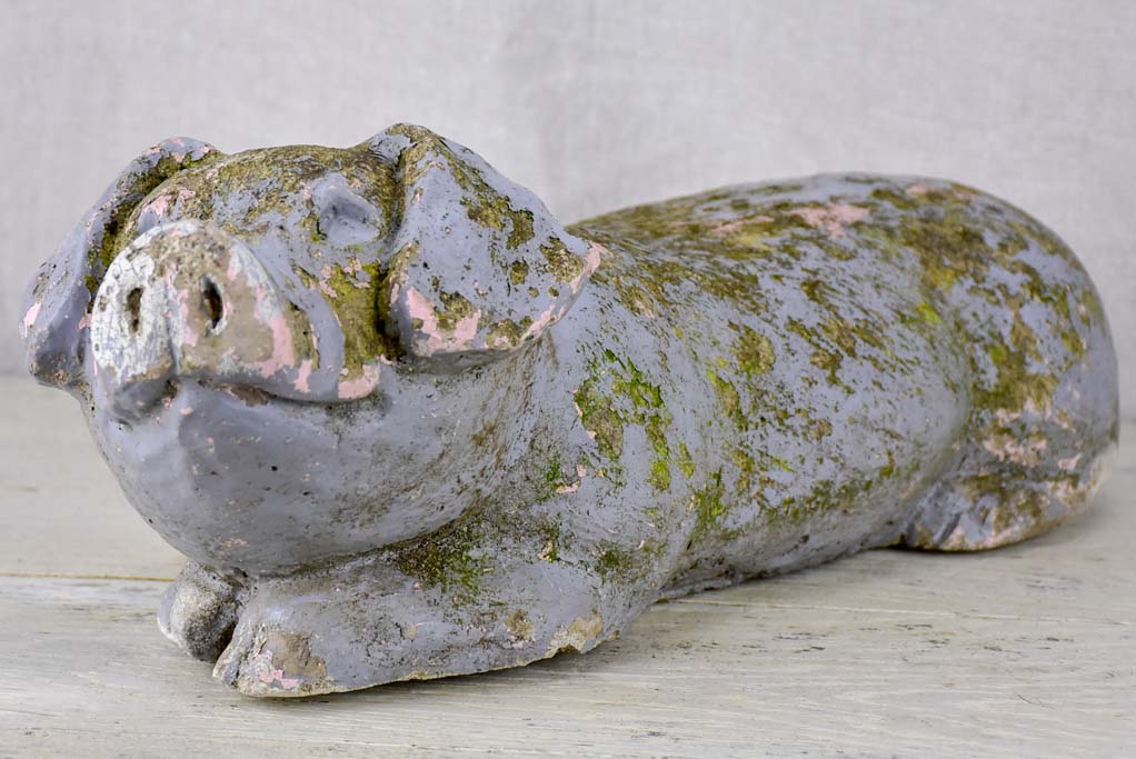 Antique French statue of a resting pig