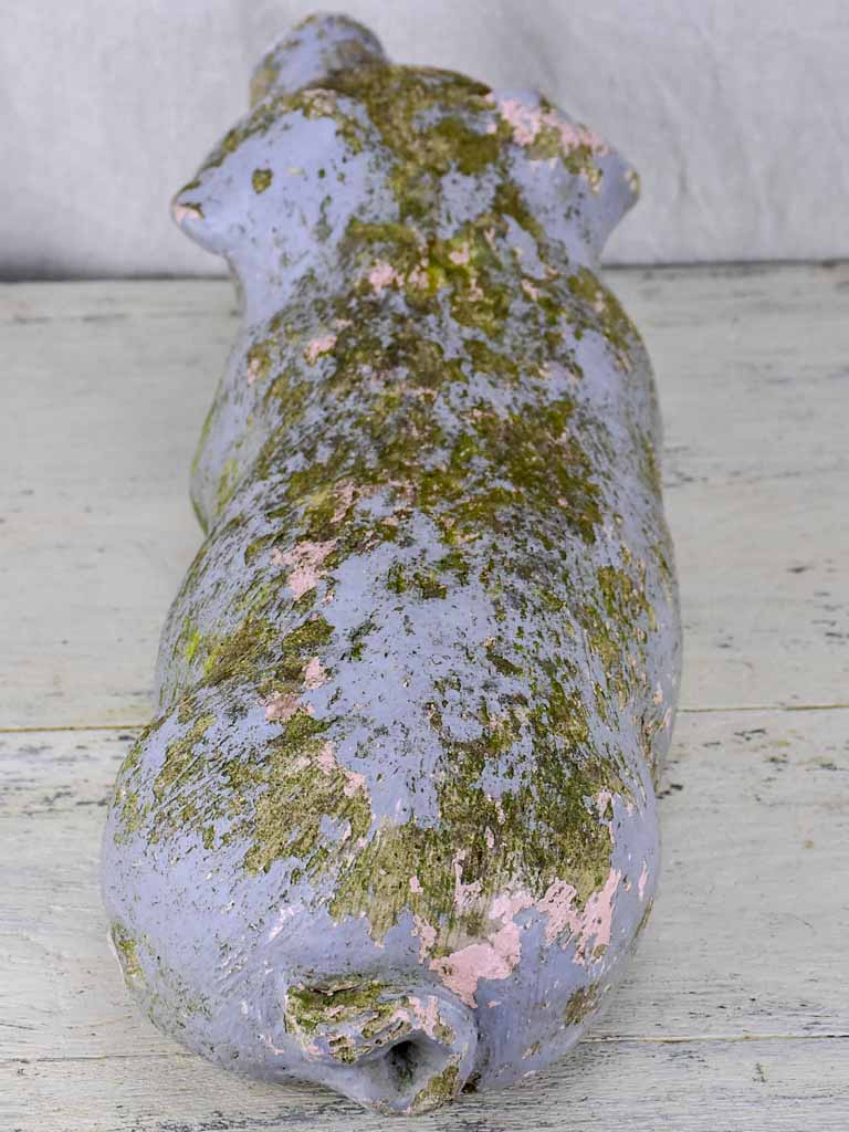 Antique French statue of a resting pig