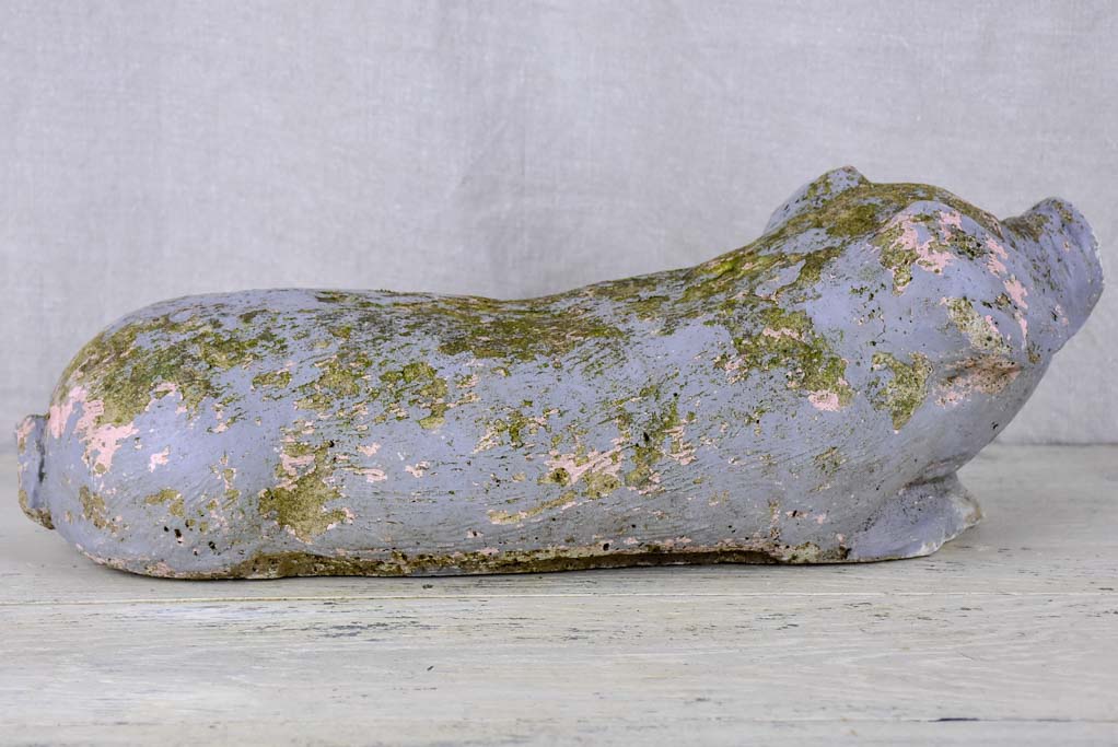 Antique French statue of a resting pig