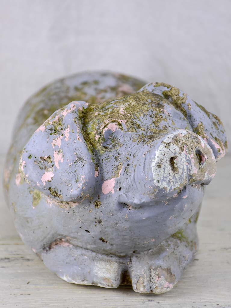 Antique French statue of a resting pig