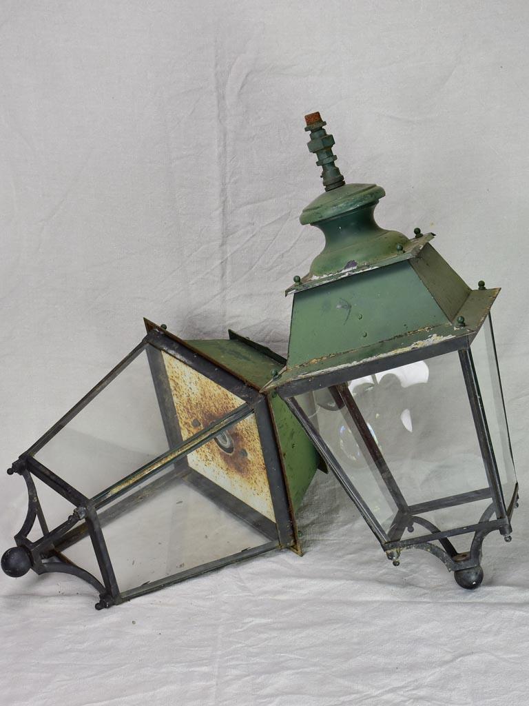 Pair of very large antique French lanterns with black and green patina