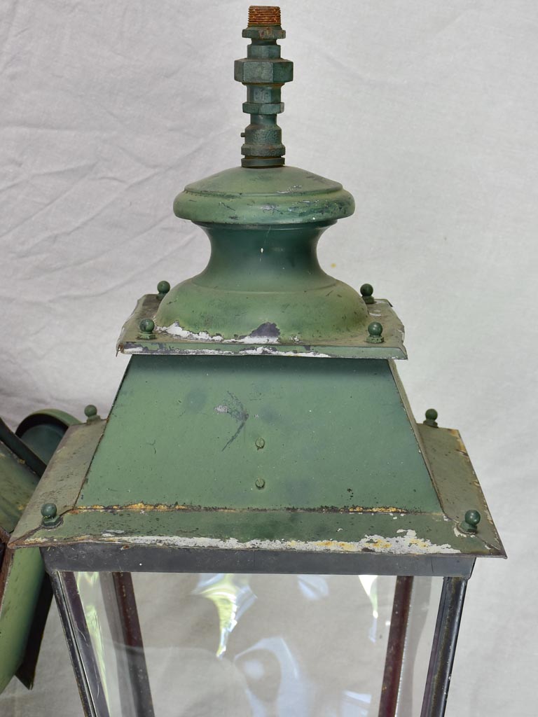 Pair of very large antique French lanterns with black and green patina